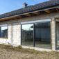 newly installed opened window with roller shutters house construction 85x85